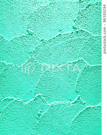 Vertical background image of a color wall of bright green clay with trowel marks 96389294