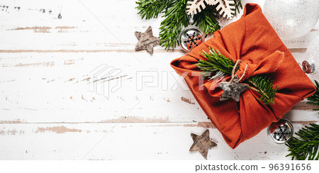 Gift in eco friendly reusable fabric package furoshiki 96391656