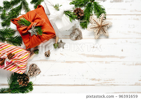 Gifts in eco friendly reusable fabric package furoshiki 96391659