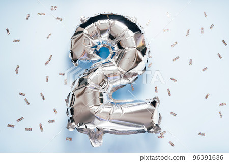 Silber balloon number 2 on light glitter background 96391686