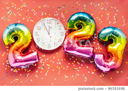 2023 New Year Celebration - colorful balloon numbers on red background 2023 New Year Celebration - colorful balloon numbers on red background 96391696