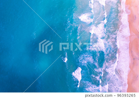 Aerial view of sea crashing waves White foaming waves on beach sand,Top view beach seascape view,Nature sea ocean background,Amazing beach background Aerial view of sea crashing waves White foaming waves on beach sand,Top view beach seascape view,Nature sea ocean background,Amazing beach background 96393265