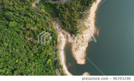 Top down from Drone aerial view of rainforest with asphalt road around the dam 96393296