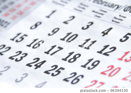 Calendar, close-up photo. Large, colorful numbers. 96394330