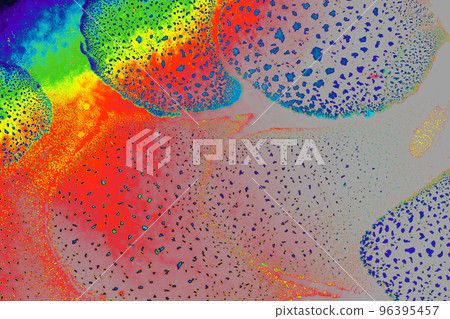 Macro shot of  water-oil emulsion over colored background 96395457