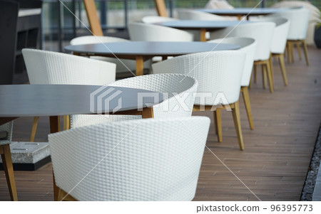 white chairs in cafe 96395773