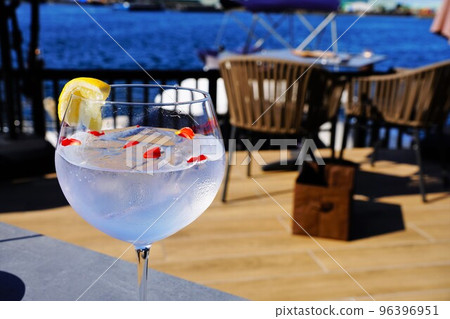 Cocktails on the terrace of a seaside restaurant Cocktails on the terrace of a seaside restaurant 96396951