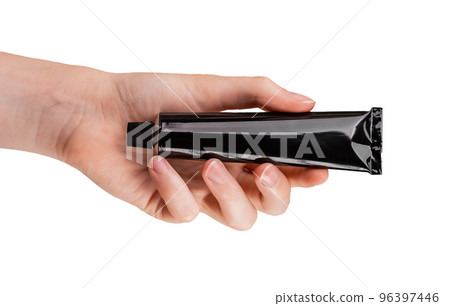 Hand holding cream tube mockup isolated on white background. Skin care, cosmetics concept. Black template. Hand holding cream tube mockup isolated on white background. Skin care, cosmetics concept. Black template. 96397446
