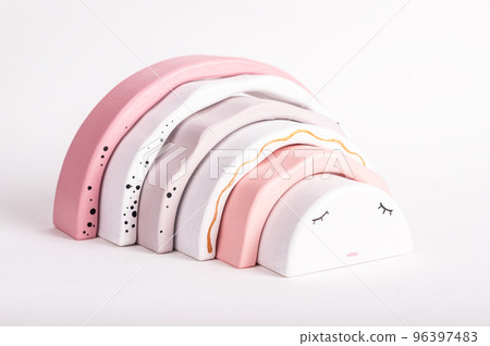 Wooden rainbow toy from arcs. Children sleep concept. Educational game for toddlers. Pretty gift. White arch with closed eyes Wooden rainbow toy from arcs. Children sleep concept. Educational game for toddlers. Pretty gift. White arch with closed eyes 96397483