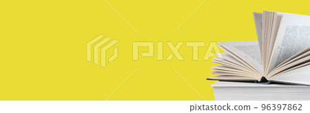 Banner with open book lying at books stack on yellow background. Reading and turning pages. Education and getting knowledge concept Banner with open book lying at books stack on yellow background. Reading and turning pages. Education and getting knowledge concept 96397862