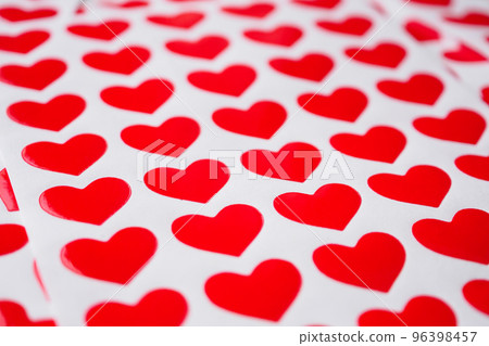 Close up red heart sticker on white paper 96398457