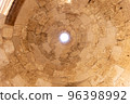 Mount Herodion and the ruins of the fortress of King Herod inside an artificial crater. The Judaean Desert, West Bank. 96398992