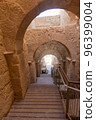 Mount Herodion and the ruins of the fortress of King Herod inside an artificial crater. The Judaean Desert, West Bank. 96399004