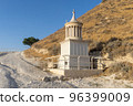 Mount Herodion and the ruins of the fortress of King Herod inside an artificial crater. The Judaean Desert, West Bank. 96399009