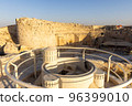Mount Herodion and the ruins of the fortress of King Herod inside an artificial crater. The Judaean Desert, West Bank. 96399010