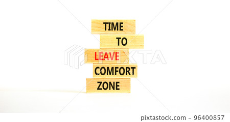 Leave comfort zone symbol. Concept words Time to leave comfort zone on wooden blocks. Beautiful white table white background. Business time to leave comfort zone concept. Copy space. Leave comfort zone symbol. Concept words Time to leave comfort zone on wooden blocks. Beautiful white table white background. Business time to leave comfort zone concept. Copy space. 96400857