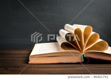 Study, learning, library or bookstore concept. Book on a wooden background 96401791