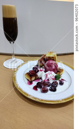 Grape waffles and iced coffee 96402073