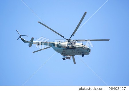 Military helicopter flies in the sky. Air Transport Military helicopter flies in the sky. Air Transport 96402427
