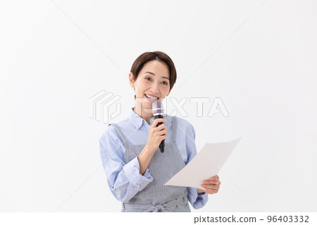 Woman reading a cooking recipe 96403332