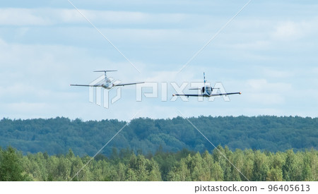 Training aircraft Aero L-39 Albatros and Aero L-29 Delfin perform a training flight at the Oreshkovo airfield. 96405613