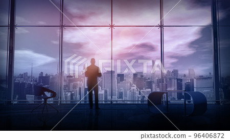 In a spacious office, a man looks at city buildings from above, 3D render. 96406872