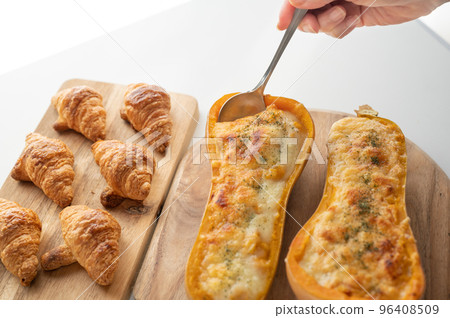 Butternut pumpkin gratin and croissant Butternut pumpkin gratin and croissant 96408509