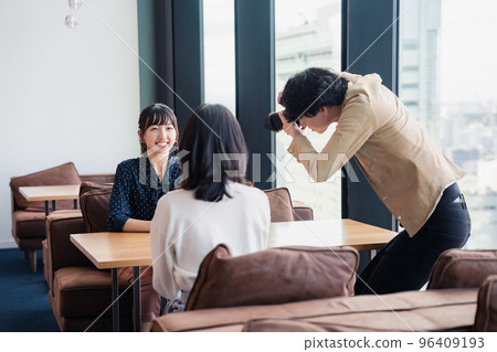 Young woman being interviewed by the media Young woman being interviewed by the media 96409193