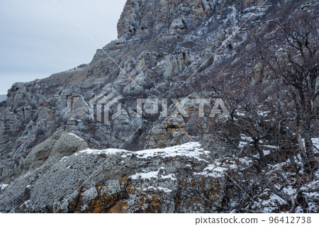 Bizarre rocks of Valley of ghosts on Mount Demerdzhi in spring. Crimea Bizarre rocks of Valley of ghosts on Mount Demerdzhi in spring. Crimea 96412738
