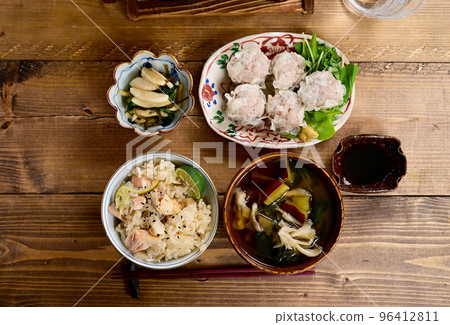 Salmon cooked rice and siomai table Salmon cooked rice and siomai table 96412811