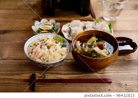 Salmon cooked rice and siomai table Salmon cooked rice and siomai table 96412813
