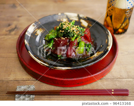 Tuna pickles and mustard seasoned rape blossoms Tuna pickles and mustard seasoned rape blossoms 96413168