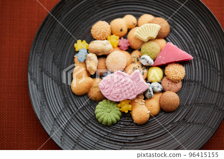 A stream of traditional Japanese sweets A stream of traditional Japanese sweets 96415155