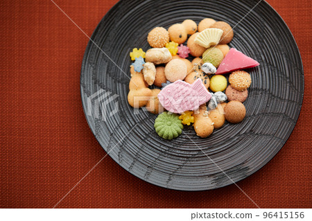 A stream of traditional Japanese sweets A stream of traditional Japanese sweets 96415156