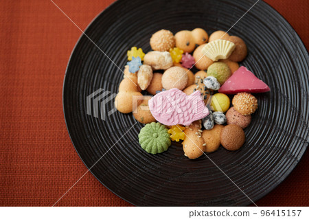 A stream of traditional Japanese sweets A stream of traditional Japanese sweets 96415157