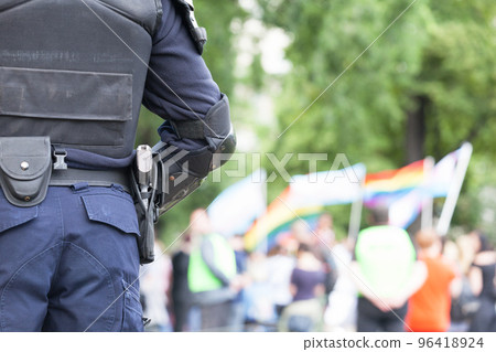 Policeman on duty during LGBT pride parade 96418924