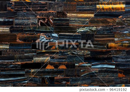 Tiger Eye Blue slab. Precious mineral quartz pattern. Exclusive luxury gemstone background. Natural semi precious stone texture. Material, background for unique interior, exterior design decoration. 96419192