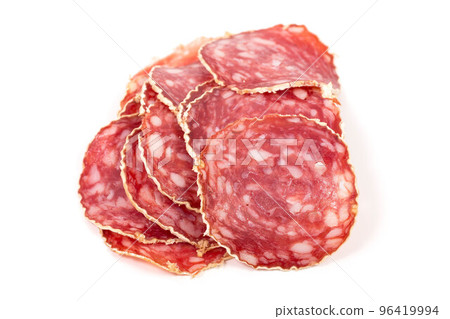 Slices of salami sausage on a white background Slices of salami sausage on a white background 96419994