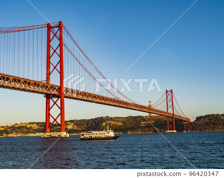 Stunning view of the 25 de Abril (25th April) suspension bridge crossing the Tagus river, Belem district, Lisbon, Portugal 96420347