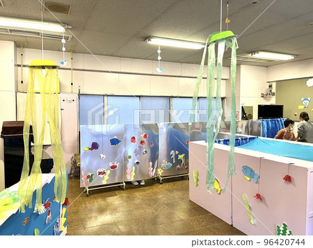 A play party held in a kindergarten classroom 96420744