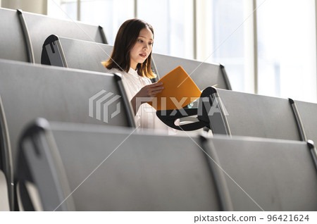 Female college student preparing for the course Female college student preparing for the course 96421624