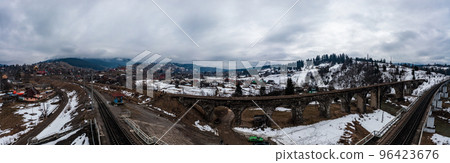 Viaduct railway bridge in the Carpathians of Ukraine, a view of the bridge from above. 96423676