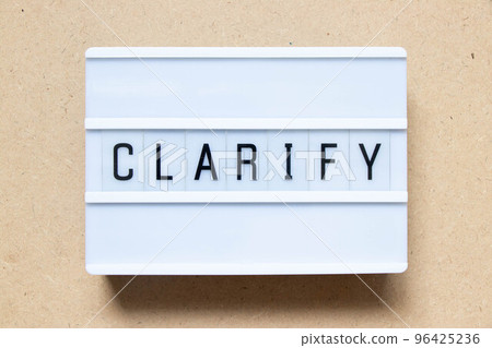 Lightbox with word clarify on wood background 96425236