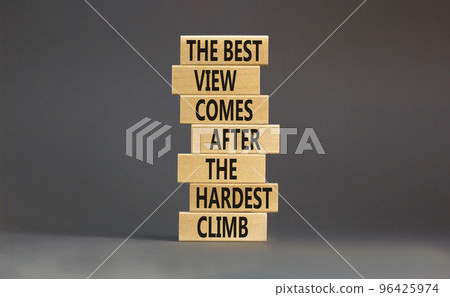Best view after the hardest climb symbol. Concept words The best view comes after the hardest climb on blocks on a beautiful grey table orange background. Business success concept. Copy space Best view after the hardest climb symbol. Concept words The best view comes after the hardest climb on blocks on a beautiful grey table orange background. Business success concept. Copy space 96425974