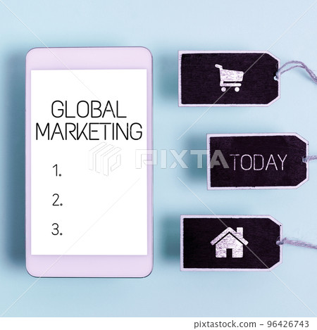 Sign displaying Global Marketing. Business overview firm sells the same products to the global market 96426743
