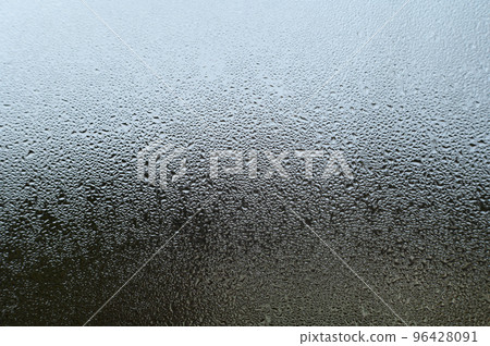 Dew drops and condensation on glass, cold season and high humidity on windows in houses. Dew drops and condensation on glass, cold season and high humidity on windows in houses. 96428091