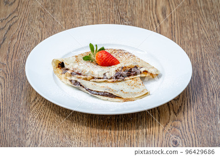 pancake with chocolate and strawberry 96429686