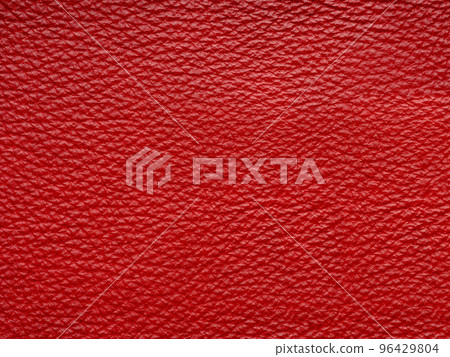 Red quality leather, natural material with design lines pattern or red abstract background. Can use wallpaper or backdrop luxury event, design upholstered furniture, clothing. Genuine leather texture. 96429804