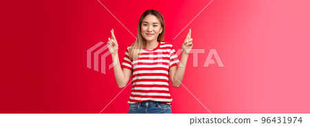 Fingers crossed for you, good luck. Cheerful cute asian blond girl wear striped t-shirt praying everything ok, wanna wish fulfill, smiling broadly look camera hopeful, anticipate positive results Fingers crossed for you, good luck. Cheerful cute asian blond girl wear striped t-shirt praying everything ok, wanna wish fulfill, smiling broadly look camera hopeful, anticipate positive results 96431974