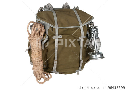 Antique vintage backpack with rope, teapot, brass mug and gas lantern 96432299
